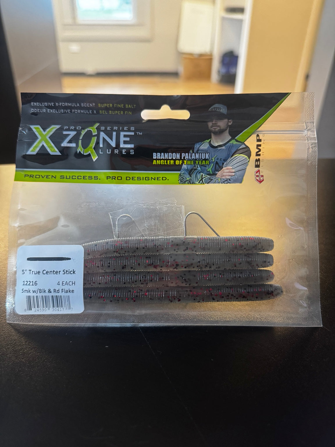 X Zone True Center Stick Smoke Black Red Flake package